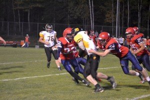Gwinn trying to get the ball out of their end zone