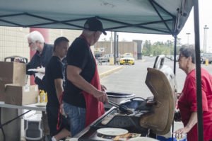 Bill grilling some great brats at Super One!