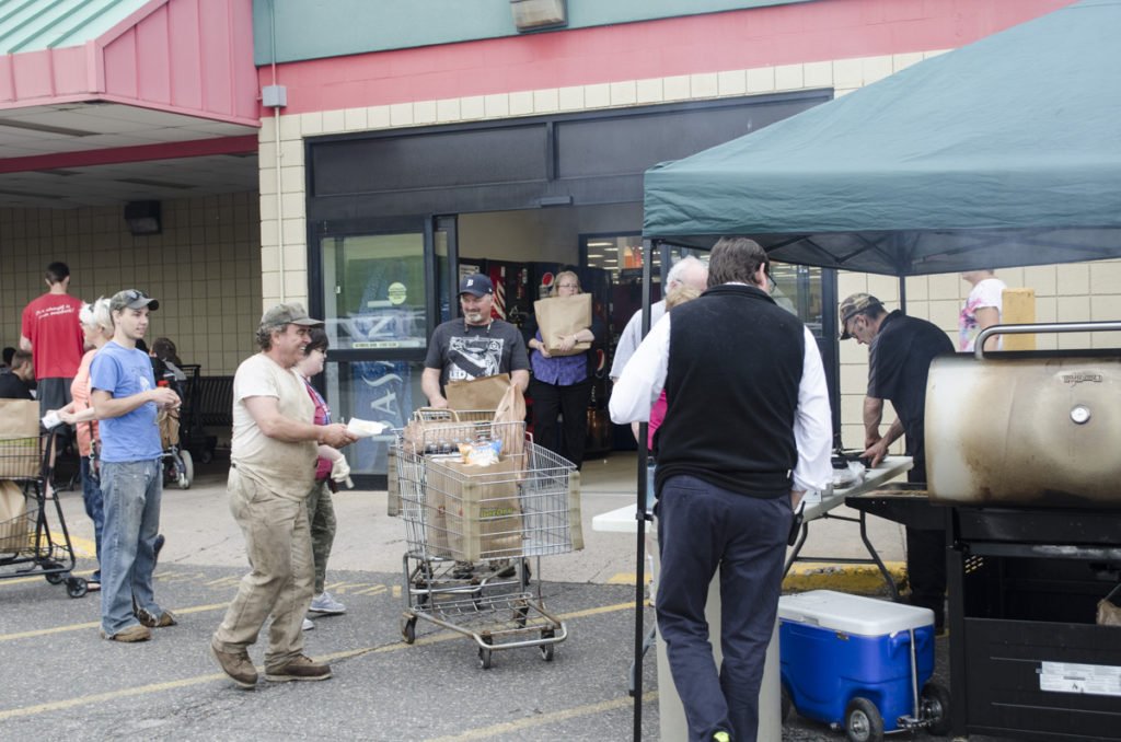 There were people lined up outside the store ready for a juicy brat.