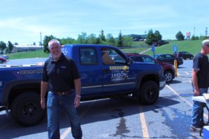 Bill Tibor outside the Lowell Larson truck