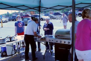 Happy people receive steak sandwich lunch