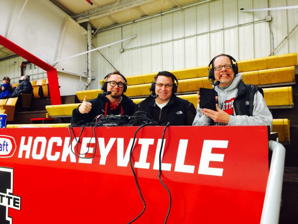 The Redmen hockey broadcast team