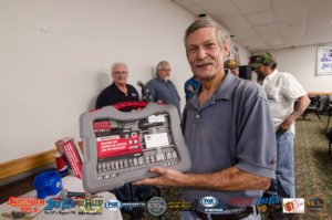 Kevin Stank with his new socket wrench set from Advanced Auto Parts.