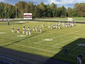 The Blue Devils warm up.