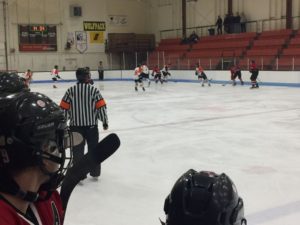 The Redmen fight to stay on offense.