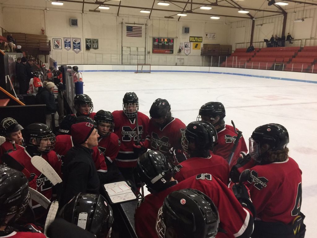 Coach Doug Garrow gets his team ready for the final face off.