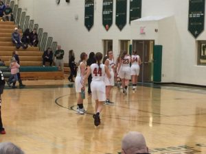 The Marquette girls heading to the locker room after their decisive victory