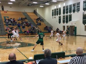 The Titans work the ball around, while Marquette defends