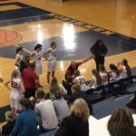 Coach Ben Smith takes a time out.