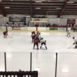 The Marquette Redmen facing off against the Kingsford Flivvers