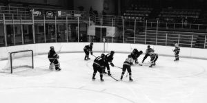 Marquette tries to win a face off in their zone.