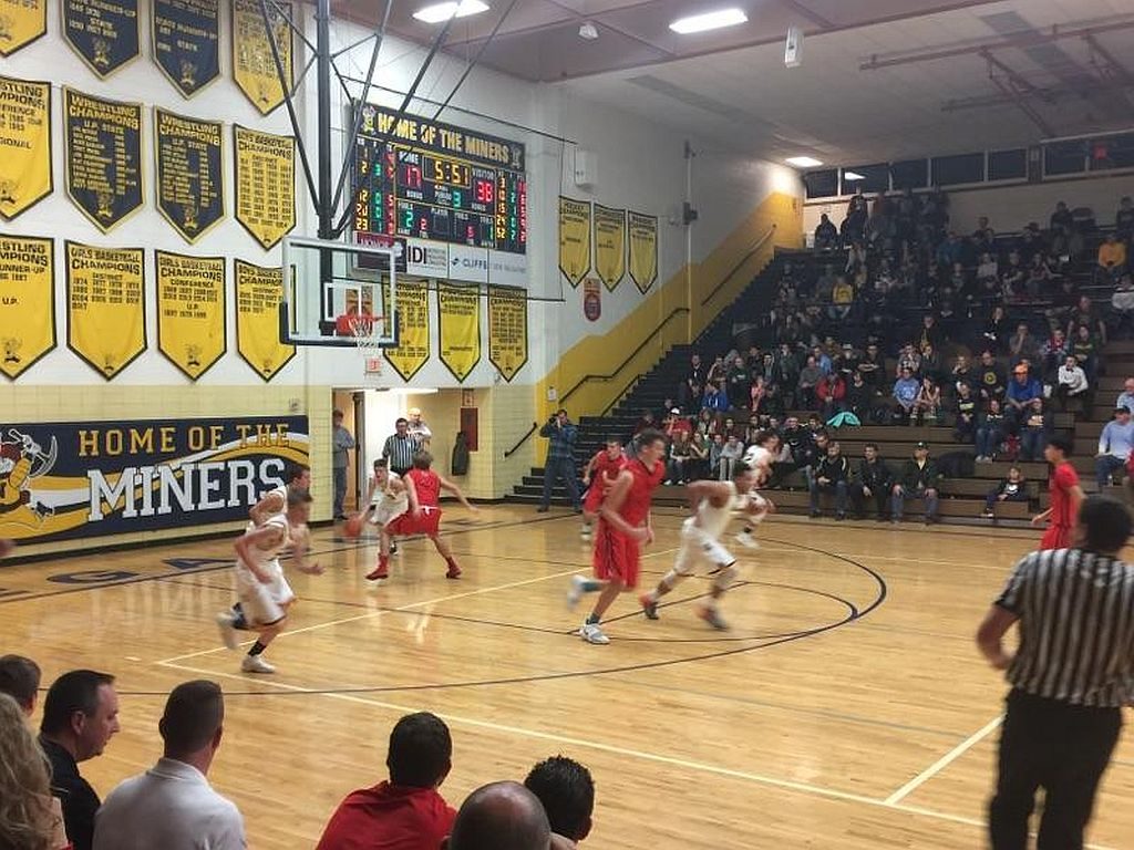 Negaunee takes control and tries to bring the ball up court