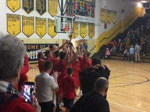 The Marquette Redmen lift the Victors' Cup