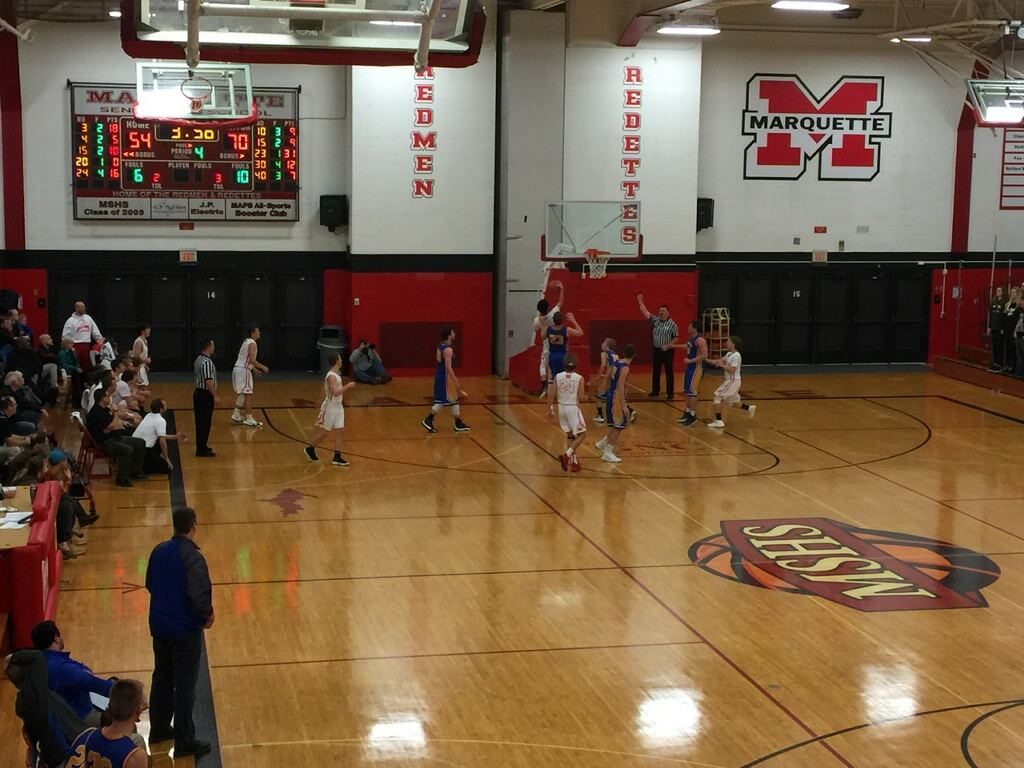 Marquette lays it up, trying to stage a comeback.