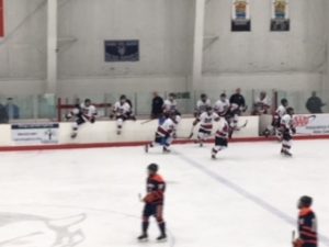 Marquette takes control of the puck to move it out of their zone.
