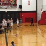Marquette coach Ben Smith tells his players what to do