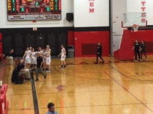 Marquette coach Ben Smith tells his players what to do