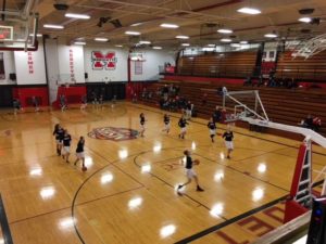 Marquette practicing their layups before the game