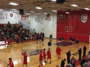 The Redmen and the Patriots warming up before the game