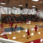 The Marquette Redmen gearing up for their game against the Westwood Patriots