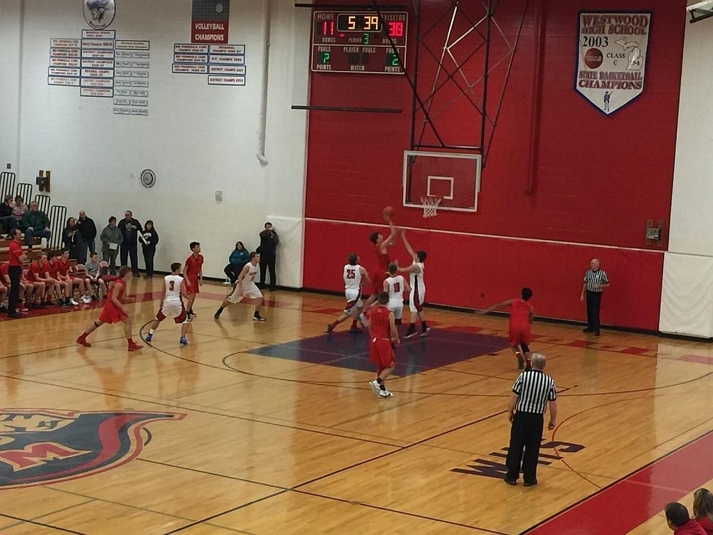 The Redmen attacking the Westwood basket