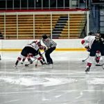 The Marquette Redmen and the Escanaba Eskymos facing off.