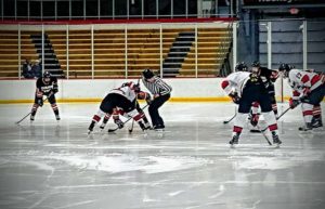 The Marquette Redmen and the Escanaba Eskymos facing off.