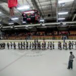 The two teams shake hands after a hard-fought game