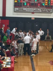 Marquette thinks of a play during a timeout