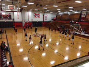The Marquette Redettes and the Escanaba Eskymos getting set for the game