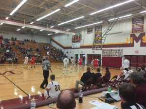 Menominee defending against a Marquette attack