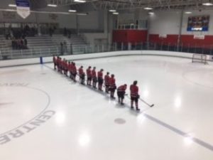 The Marquette Redmen lined up for the national anthem