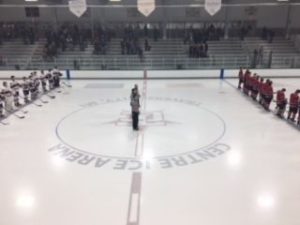 The teams eagerly await the start of the game