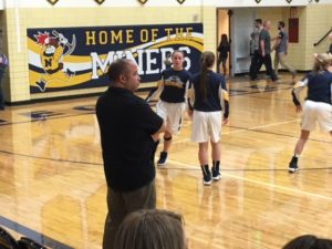 Marquette coach Ben Smith watching the teams warm up