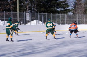 Playing some traditional outdoor ice hockey!