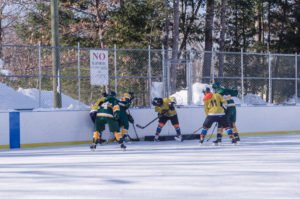 Playing some good defense at the goal.