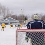 Grey team going for shot on goal.