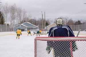 Grey team going for shot on goal.