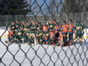 After the game, the teams gathered for a group picture