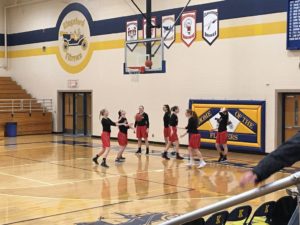 The Redettes warming up for their game against the Kingsford Flivvers