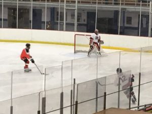 Marquette goaltender Dylan Sibilsky watches the puck to his left