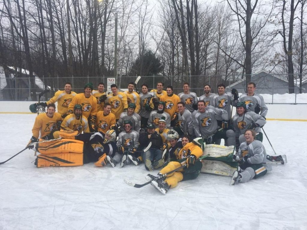 The NMU Hockey Team at Lions Field for the Ice Under Cover Hockey Bash Scrimmage game.