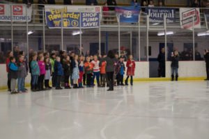 The third graders from Sandy Knoll sang the National Anthem.