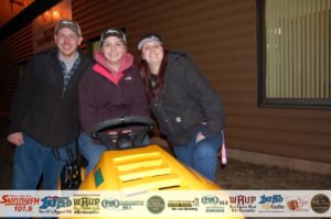 Tasha Vangundy, with her mowing neighbors: Matt and Renee