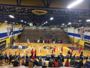 The Redmen and the Wildcats warming up before the game