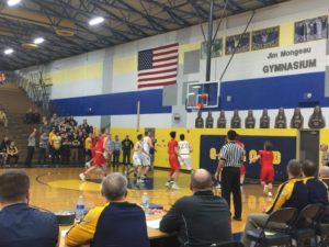 The Marquette Redmen attempt a shot in the second half