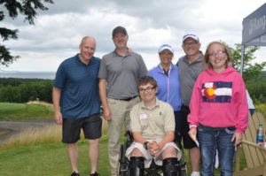 Some of the kids from Bay Cliff Golf Course with their sponsors.