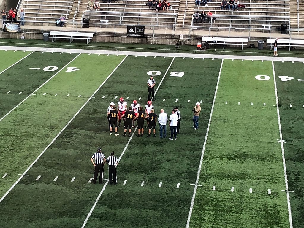 The Redmen take on the Trojans in Traverse City.