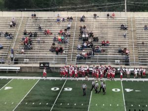 The Redmen take the field at Traverse City Central.