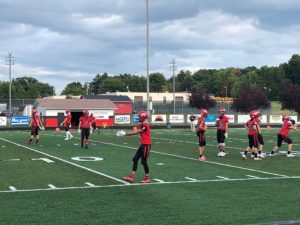The Marquette Redmen face off against the Escanaba Eskymos.